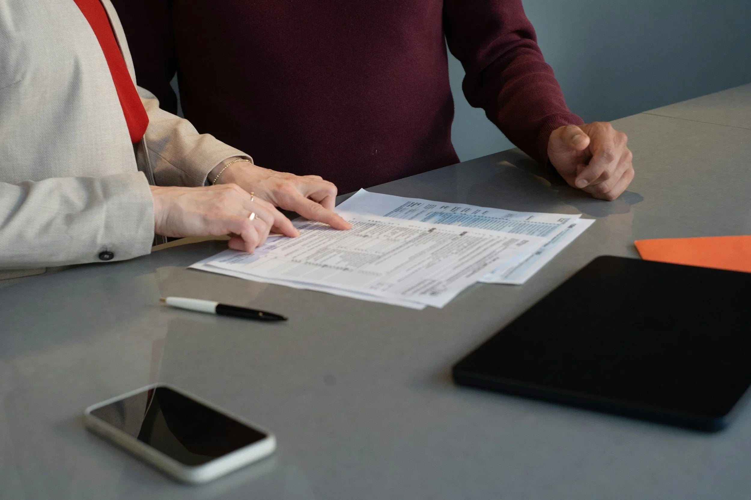 Couple looking over financial statements